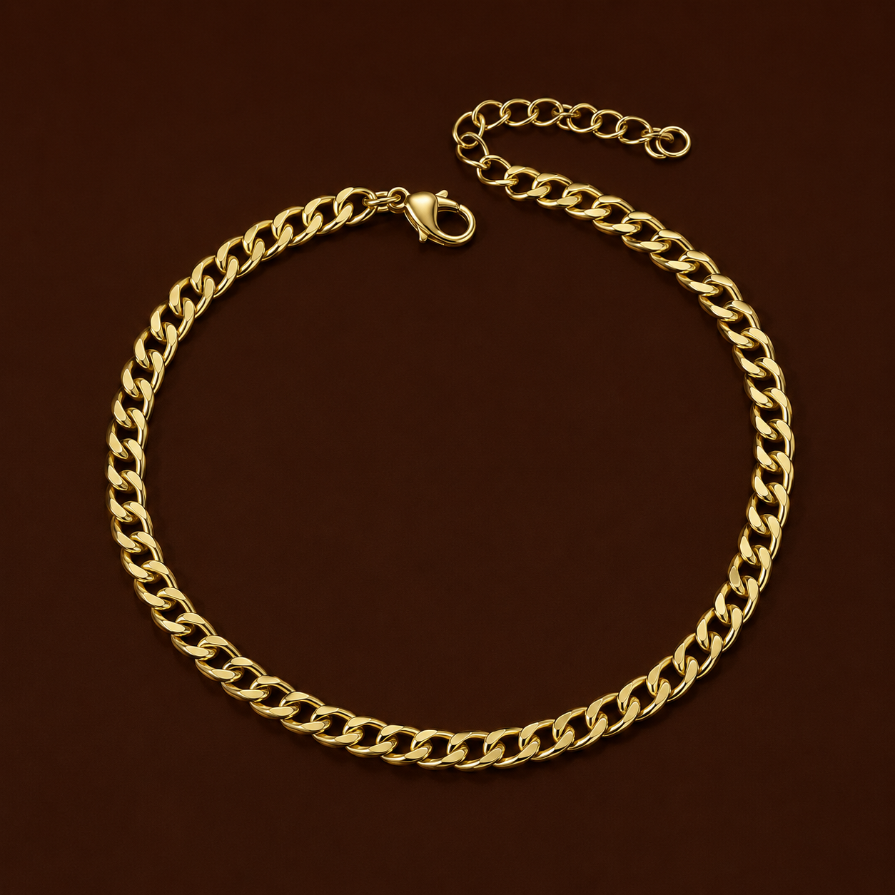 Cuba Anklet gold chunky Cuban link anklet on dark background – non-tarnish hypoallergenic stainless steel gold ankle bracelet for women