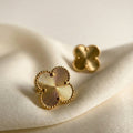 Eva Studs gold clover stud earrings with radiating guilloché sunburst engraving and beaded border on ivory silk – tarnish-free waterproof stainless steel earrings for sensitive ears