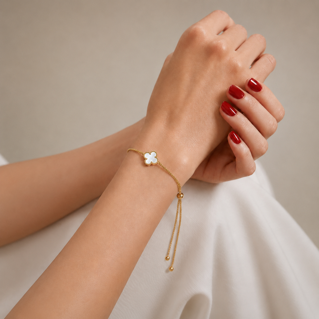 Fleur Bracelet mother of pearl clover bracelet on wrist – dainty adjustable gold four leaf clover bracelet, hypoallergenic stainless steel UK jewellery