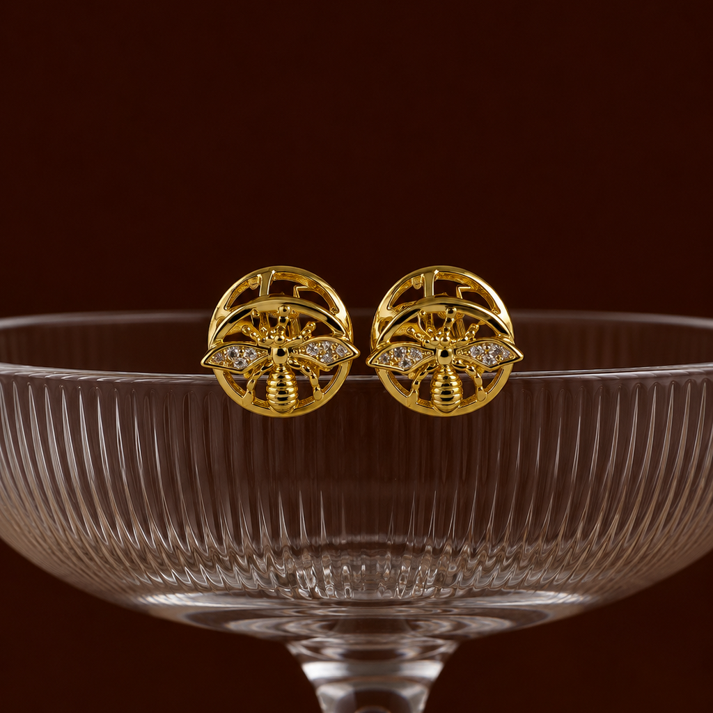 Kamsee Studs two way gold bee stud earrings with cubic zirconia wings inside open circular frame on cocktail glass – nickel-free non-tarnish surgical steel CZ stud earrings