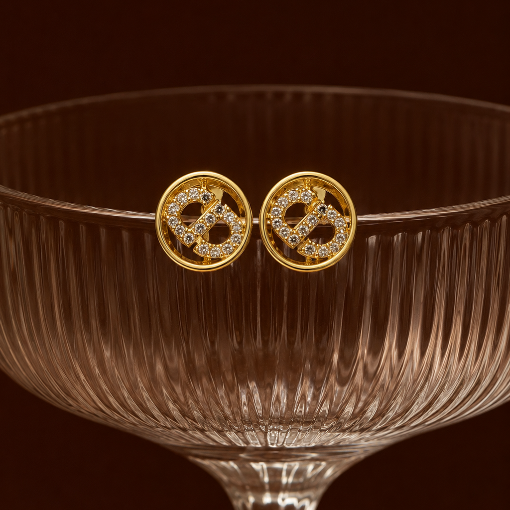 Kamsee Studs two way gold monogram earrings with pavé cubic zirconia letter design inside circular frame on cocktail glass – nickel-free surgical steel zirconia stud earrings
