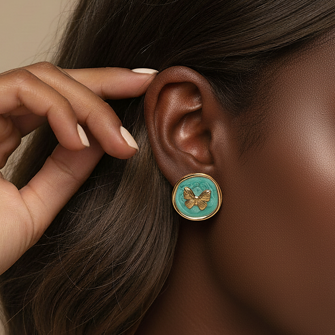 Kora Studs teal butterfly stud earrings with raised gold butterfly – tarnish-free enamel disc earrings, waterproof and safe for sensitive ears