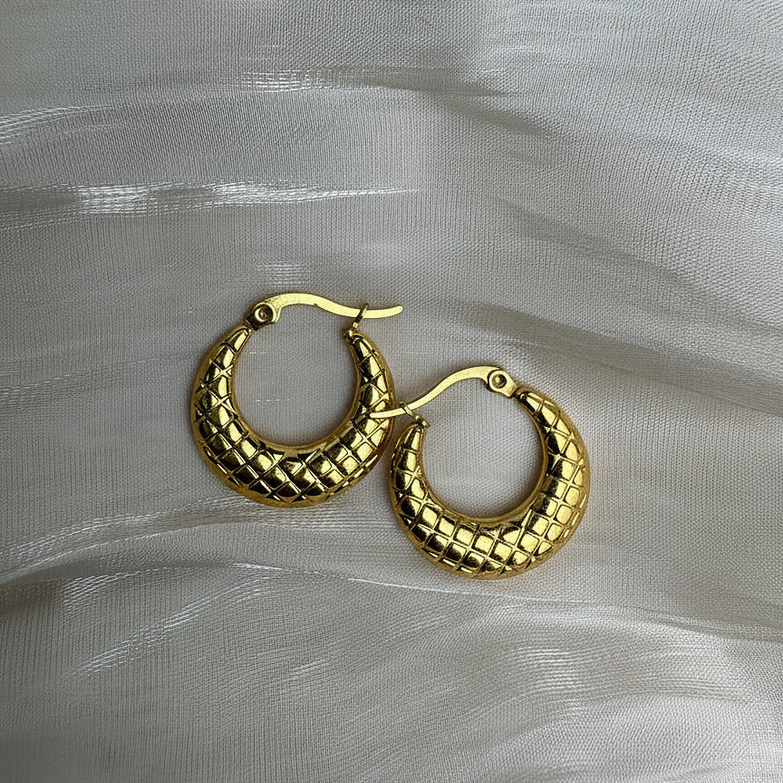 Mara Hoops gold hoop earrings on white satin – quilted earrings with crescent earrings detail, non tarnish earrings, waterproof earrings, stainless steel earrings
