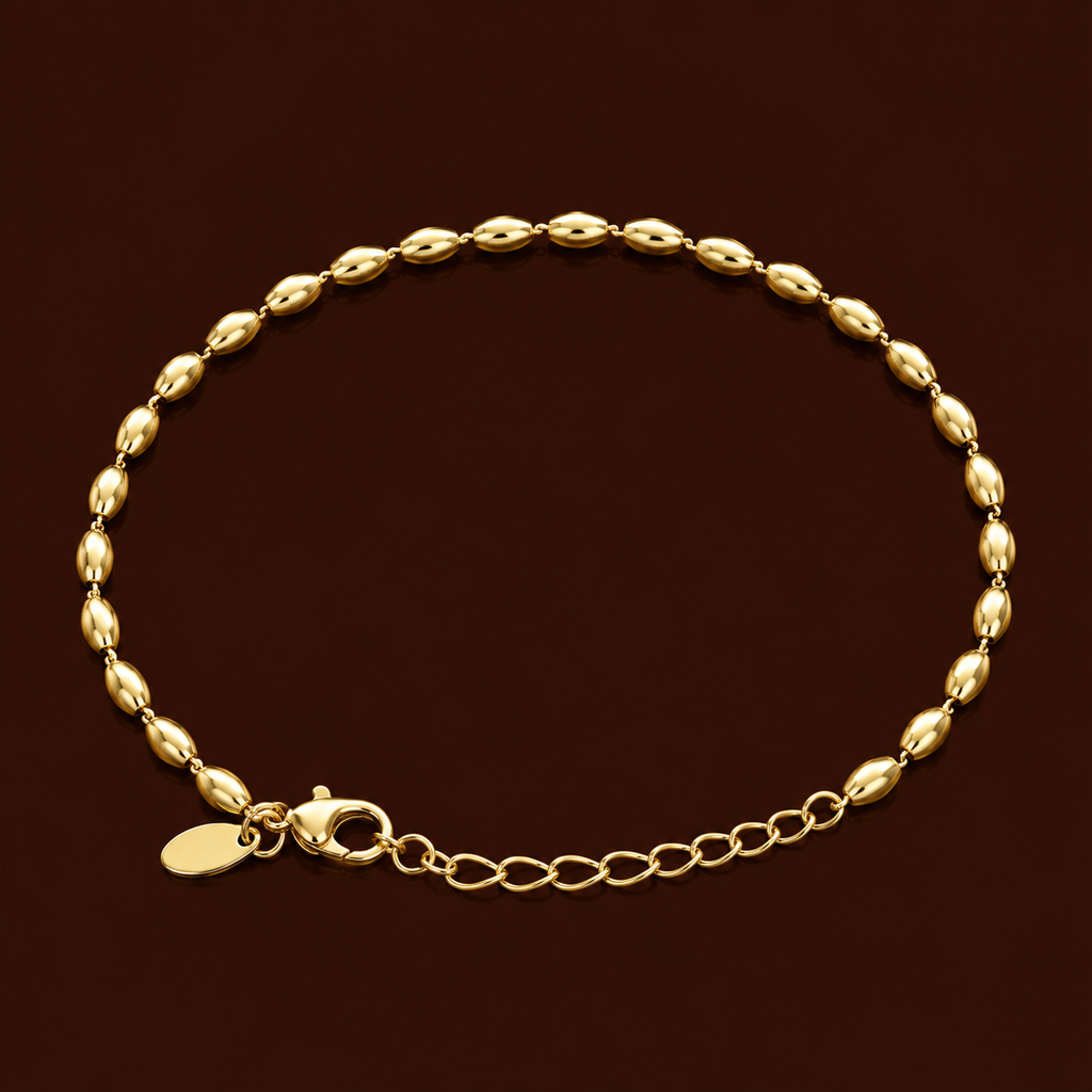 Mee-Mee Bracelet gold oval bead bracelet on dark background – dainty adjustable gold beaded bracelet, non-tarnish waterproof hypoallergenic stainless steel women's bracelet