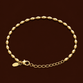 Mee-Mee Bracelet gold oval bead bracelet on dark background – dainty adjustable gold beaded bracelet, non-tarnish waterproof hypoallergenic stainless steel women's bracelet