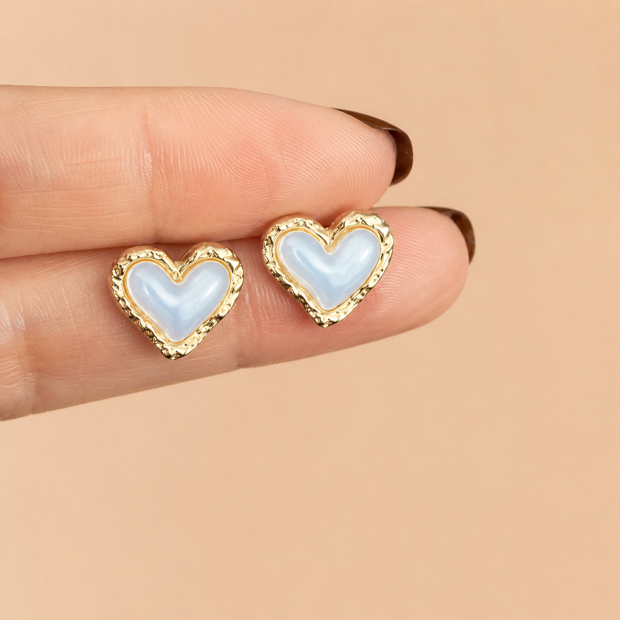 Mio Studs pearl heart stud earrings with blue mother of pearl centre and textured hammered gold border – hypoallergenic waterproof nickel-free stainless steel heart earrings