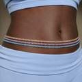 Model wearing RiRi Waist Beads in pastel set on dark skin – african waist beads, body jewellery uk, intimate jewellery for daily wear