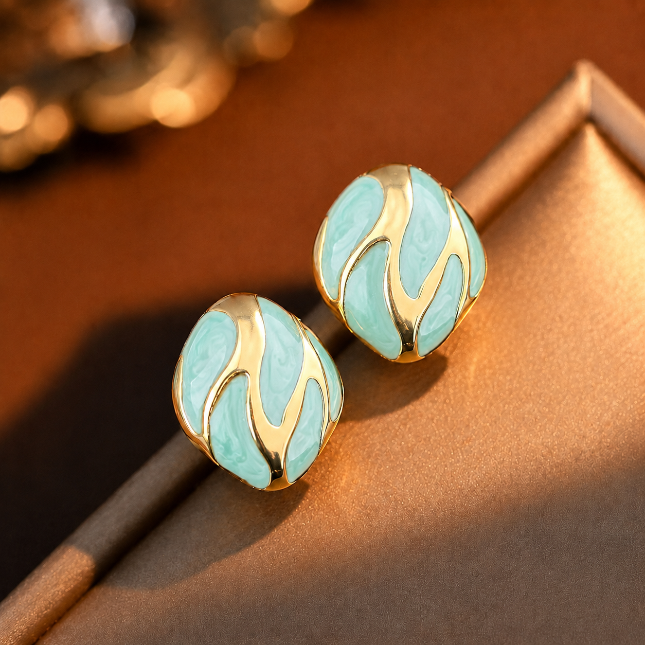 Riva Studs mint green and gold enamel swirl oval stud earrings with bold wave detail – hypoallergenic nickel-free stainless steel non-tarnish earrings for sensitive ears