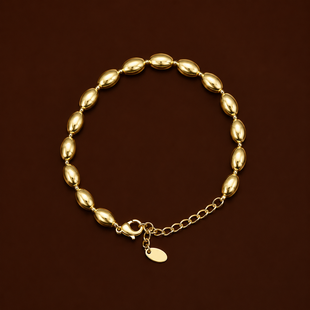 Ro Bracelet gold oval bead bracelet on dark background – adjustable stackable gold beaded bracelet, non-tarnish waterproof hypoallergenic stainless steel women's bracelet