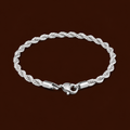 Tessa Bracelet silver twisted rope chain bracelet on dark background – stackable silver chain bracelet, non-tarnish waterproof hypoallergenic stainless steel women's bracelet