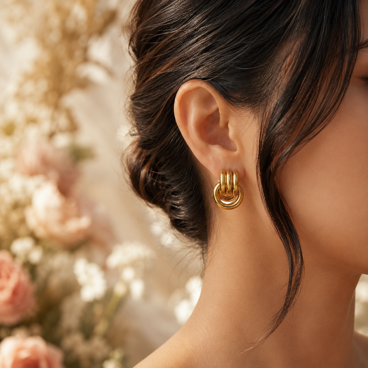 Model wearing Zia Earrings door knocker earrings in profile – gold drop earrings, statement drop earrings, drop stud earrings, hypoallergenic earrings for sensitive ears