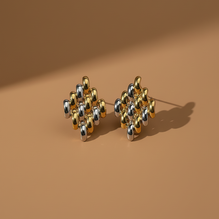 Zuri Studs gold and silver diamond lattice cluster stud earrings on warm beige background – two tone geometric earrings waterproof water resistant stainless steel nickel-free